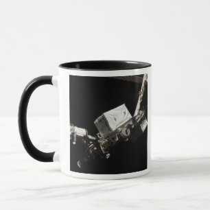 Taza El brazo robótico del sistema de manipulante