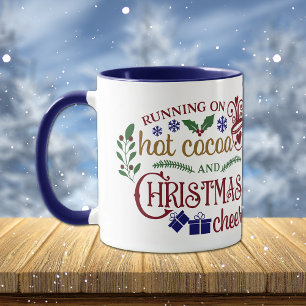 Taza El cacao caliente y los Navidades saludan