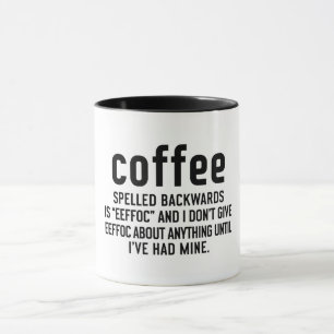Taza El café espelado hacia atrás