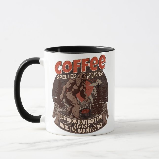 Taza El Café Que Se Espolea Hacia Atrás Es Eeffoc (Izquierda)