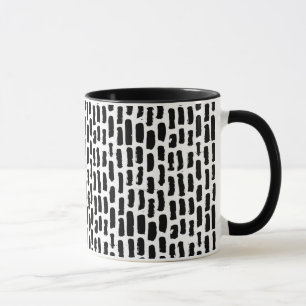 Taza El cepillo negro frota ligeramente el modelo