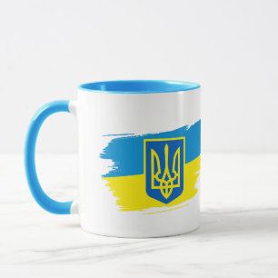 Taza El escudo de armas de Ucrania en la bandera del es