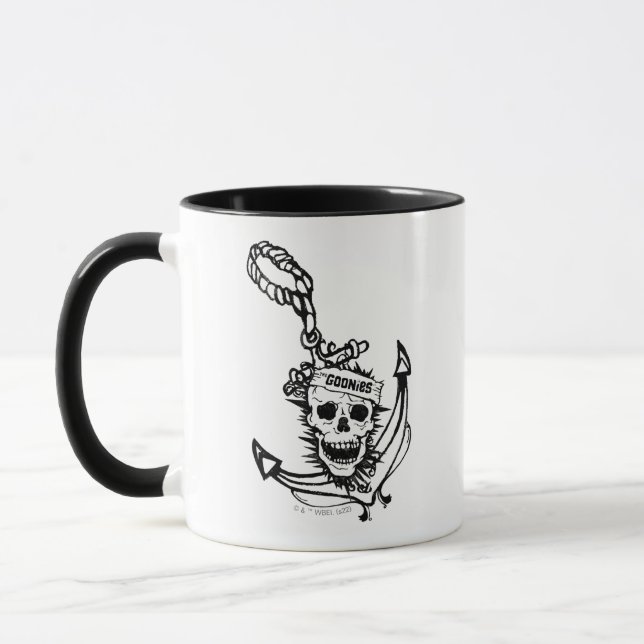 Taza El gráfico de la bandera y el cráneo de los Goonie (Izquierda)