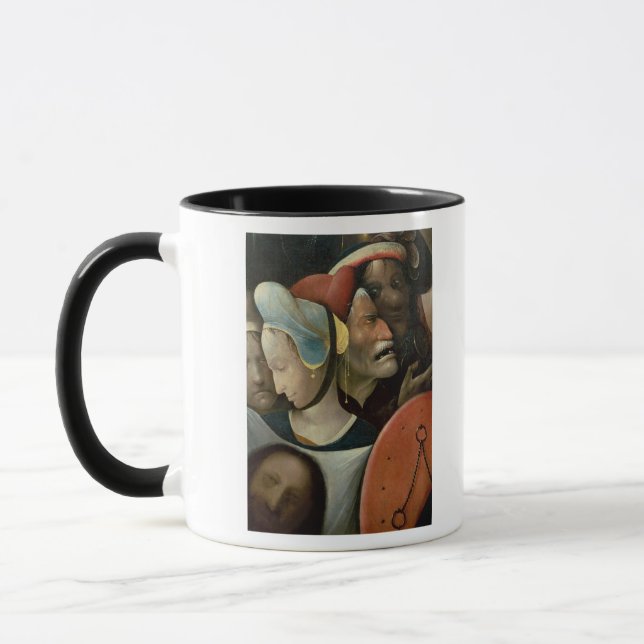 Taza El llevar de la cruz que muestra tres caras (Izquierda)