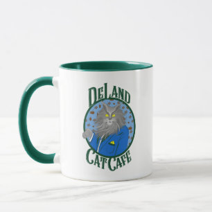 Taza El logo de Henry DeCat Cafe de DeLand con traje az
