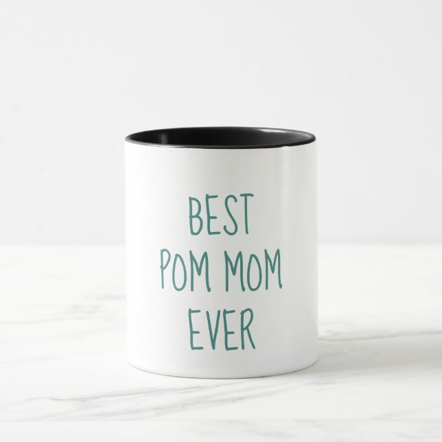 Taza El mejor dueño siempre divertido de Pomeranian de (Centro)