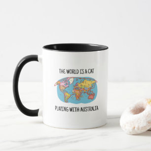 TAZA EL MUNDO ES UN GATO JUGANDO CON AUSTRALIA