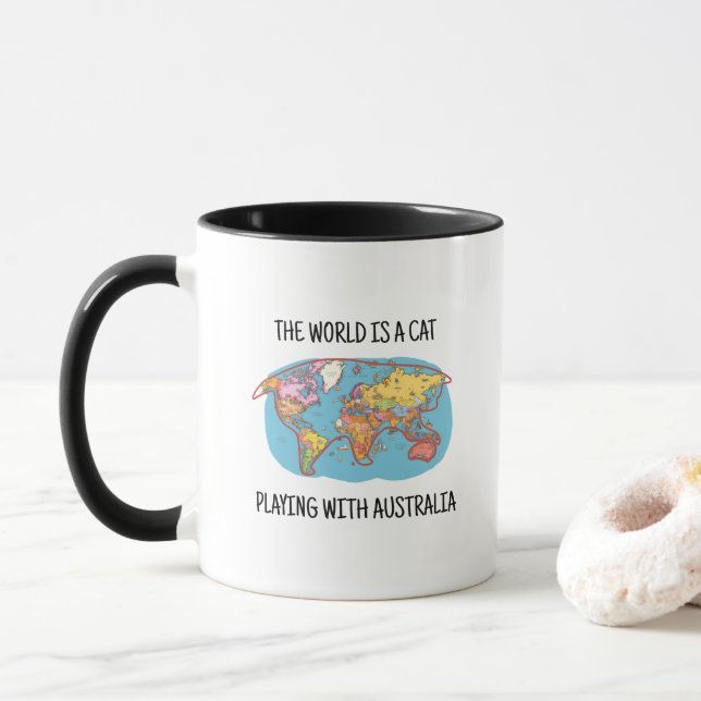 TAZA EL MUNDO ES UN GATO JUGANDO CON AUSTRALIA (Con donut)