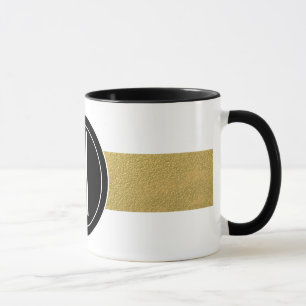 TAZA EL RELIEVE METALIZADO DORADO RAYA EL MONOGRAMA