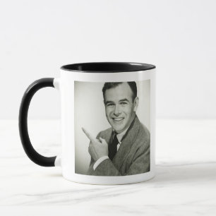 Taza El señalar del hombre de negocios
