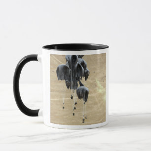 Taza El sistema de envío de envase lía el paracaídas