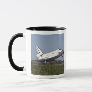 Taza El transbordador espacial Atlantis aterriza en Run