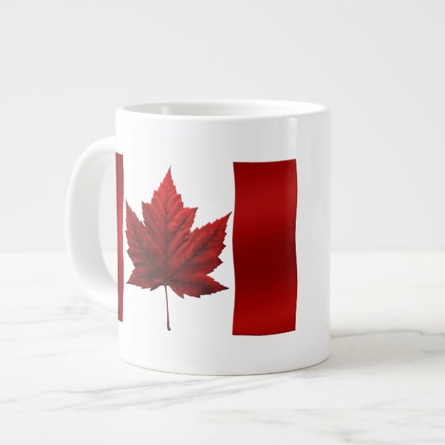 Taza enorme del recuerdo de Canadá de la taza de (Izquierda)