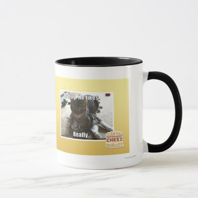 Taza Es el abrazo. Él tiene gusto (Derecha)