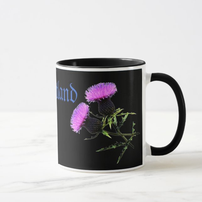 Taza Escocia, silba la flor nacional de (Derecha)