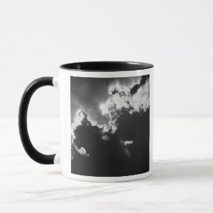 Taza Esperanza en el forro plateado de las nubes.