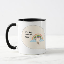 Taza "Está bien tener esperanza en la casa arcoiris"