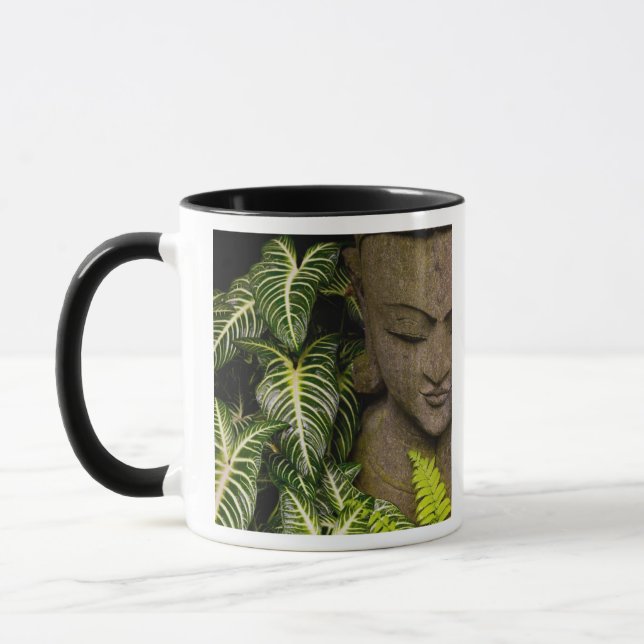 Taza Estatua en una información de ubicación del (Izquierda)