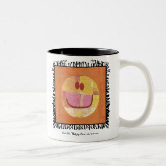 taza feliz de la cara del klee de Paul