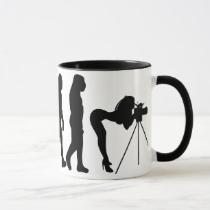 Taza femenina de la evolución del fotógrafo