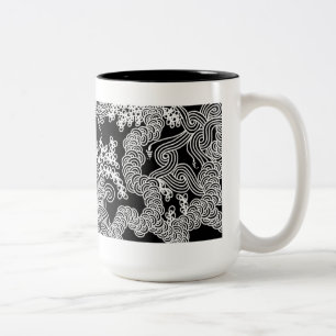 Taza floral abstracta en blanco y negro
