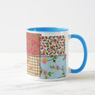 Taza floral del modelo del remiendo de la tela