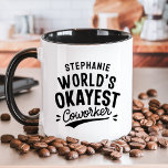 Taza Funny de los obreros más okayos del mundo<br><div class="desc">Celebra un sentido del humor en el lugar de trabajo con esta canción personalizada "The Okayest Coworker". Perfecto para compañeros de trabajo con un espíritu lúdico, esta taza le permite añadir su nombre para un toque único. Es un regalo ideal para eventos de oficina, Secret Santa, o simplemente para darle...</div>