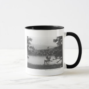 Taza Ganado por una charca con dos vaqueros