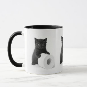 Taza Gatito negro bebé protegiendo rollo de papel higié