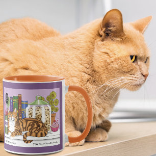 Taza Gato atigrado naranja descarado en la encimera de