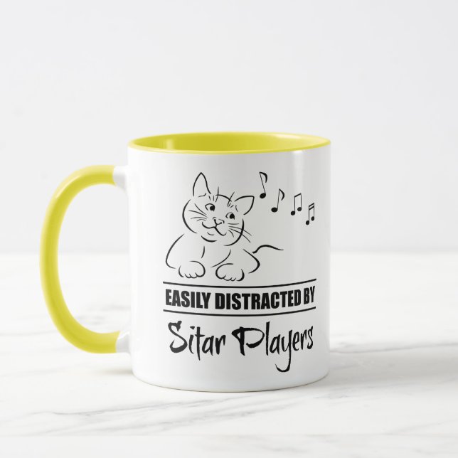 Taza Gato curioso distrado fácilmente por los guitarris (Izquierda)