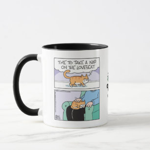 Taza Gato se sienta en sofá pequeño (regazo)