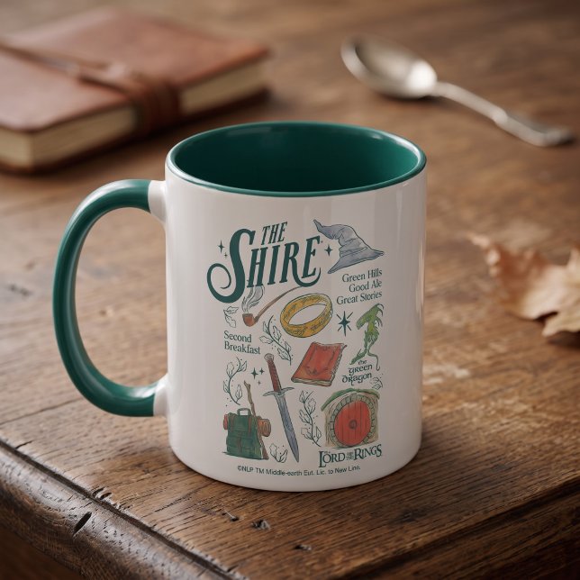Taza Gráfica de Collage de Acuarela de La Comarca™ (Simulated mug on table)