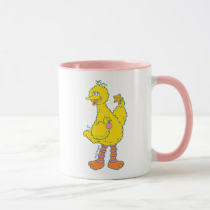 Taza Gran Pájaro sosteniendo adornos navideños