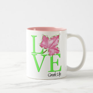Taza griega de la vida del amor rosado y verde