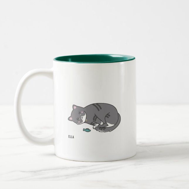 taza gris del gato de tabby (Izquierda)