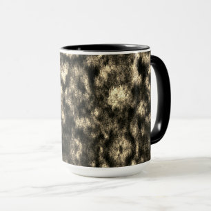 Taza Gris, sepia o beige manchado con efecto plumón.