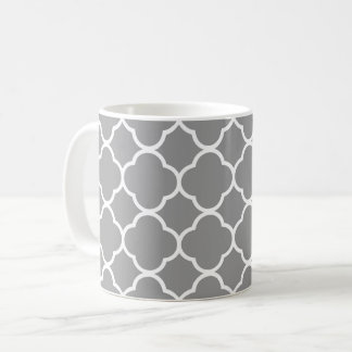 Taza gris y blanca elegante del té del café de