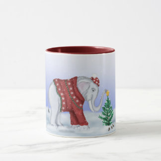 Taza hecha punto del suéter del elefante a