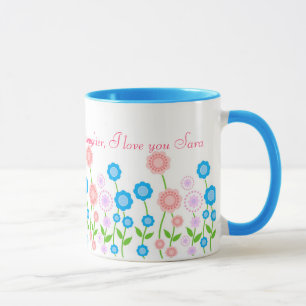 Taza hermosa de las flores para la hija