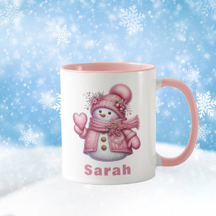 Taza Hombre de nieve rosa sostiene a Navidades de coraz