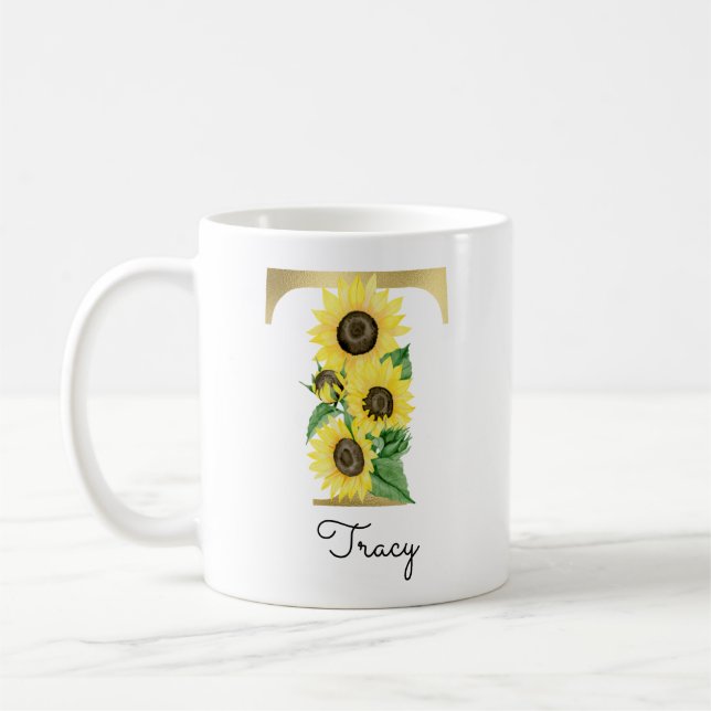 Taza inicial de girasol floral dorada con monogram (Izquierda)