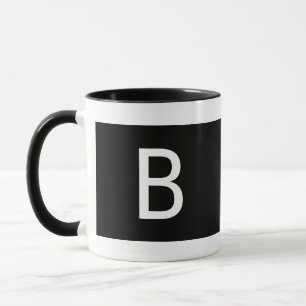 Taza inicial minimalista en blanco y negro para zu