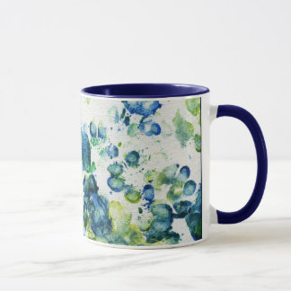 Taza irlandesa del oro con acentos