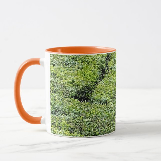 Taza Jardines de té de Munnar en café (Izquierda)
