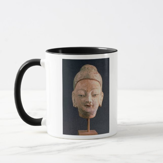 Taza Jefe de una estatua de Buda, de Bezeklik (Izquierda)