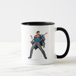Taza Kent changes into Superman