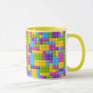 Taza La construcción plástica bloquea el modelo