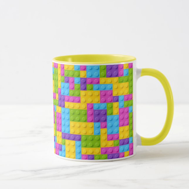 Taza La construcción plástica bloquea el modelo (Derecha)