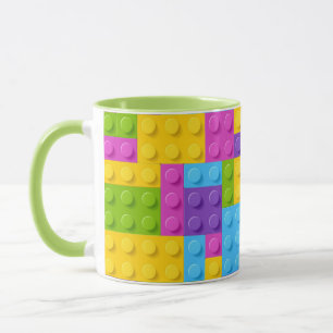 Taza La construcción plástica bloquea el modelo
